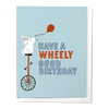 HAVE A WHEELY GOOD BIRTHDAY: RABBIT ON A UNICYCLE GREETING CARD