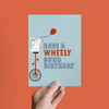HAVE A WHEELY GOOD BIRTHDAY: RABBIT ON A UNICYCLE GREETING CARD