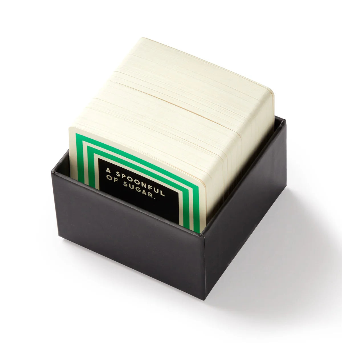 Stack of white sugar packets in a black holder with 'A Spoonful of Sugar' branding on a white background.