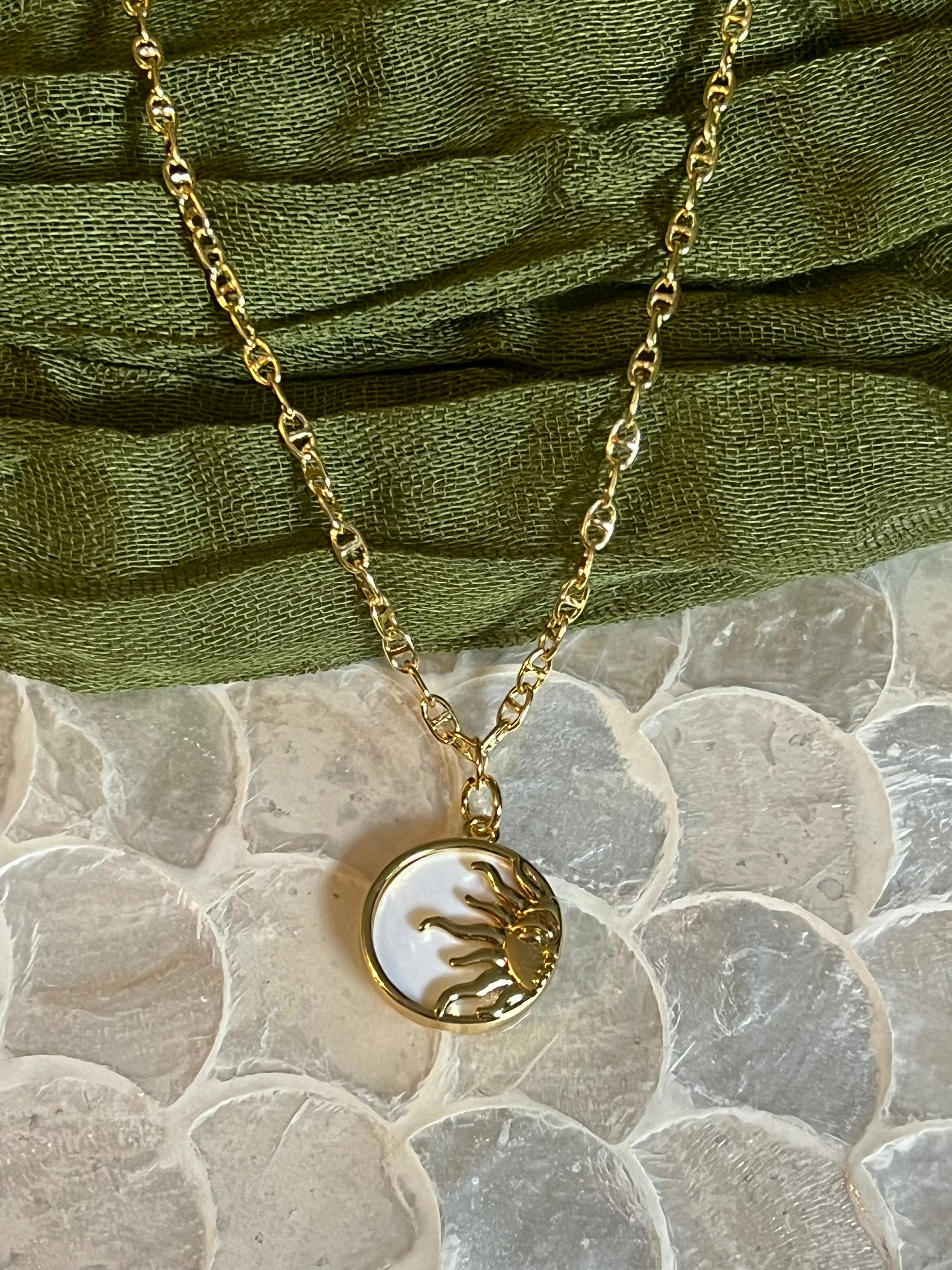 TINY GOLD HALF SUN WHITE BACKGROUND NECKLACE CBK