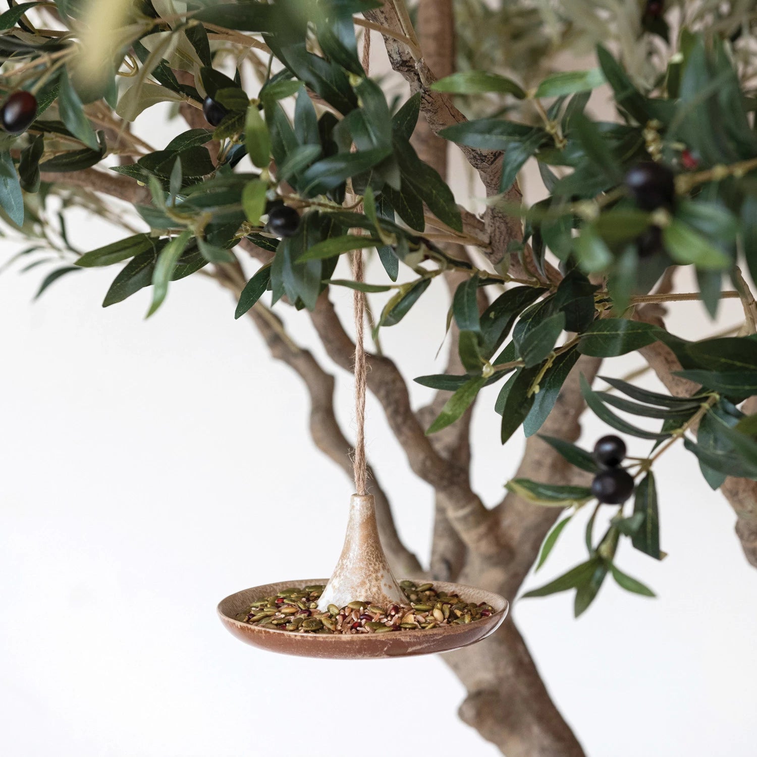 STONEWARE BIRD FEEDER W/ JUTE HANGER (EACH ONE WILL VARY)