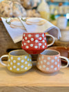 HAND-PAINTED STONEWARE MUG W/ WAX RELIEF DOTS