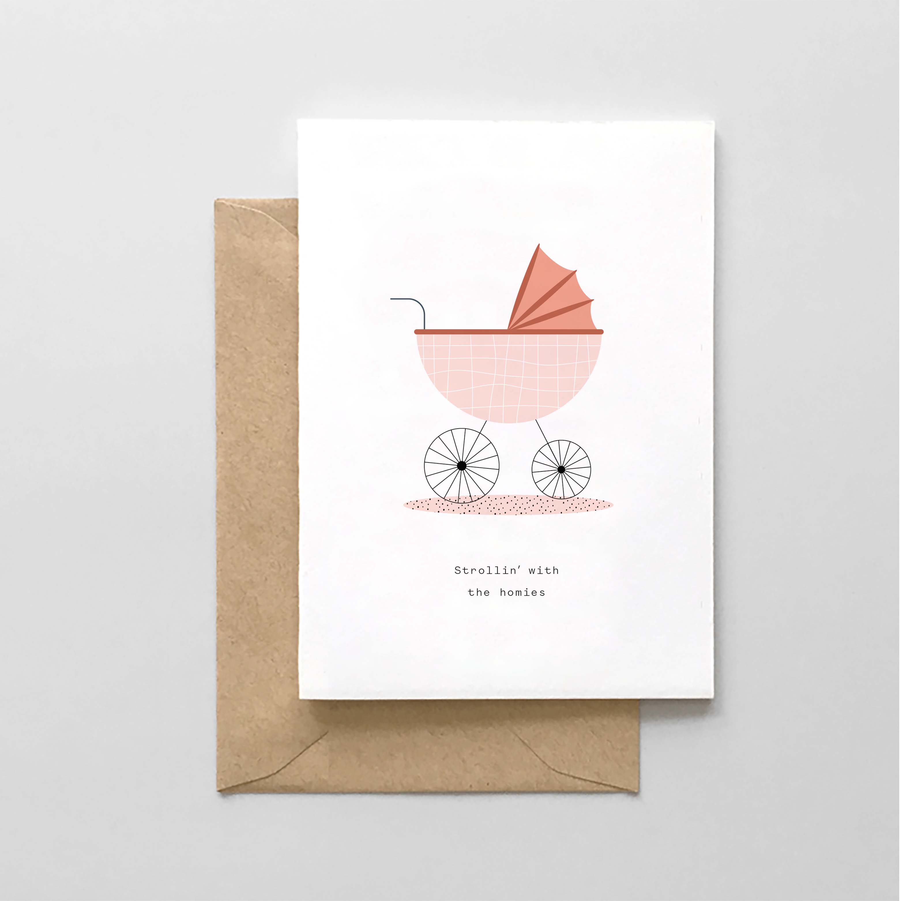 A greeting card with a simple illustration of a baby stroller and a kraft brown envelope.