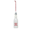 A glass milk bottle ornament with 'MILK FOR SANTA' text in red and white, hanging from a red ribbon.
