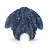 Blue textured plush bunny toy on a white background