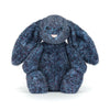 Blue textured plush bunny toy on a white background