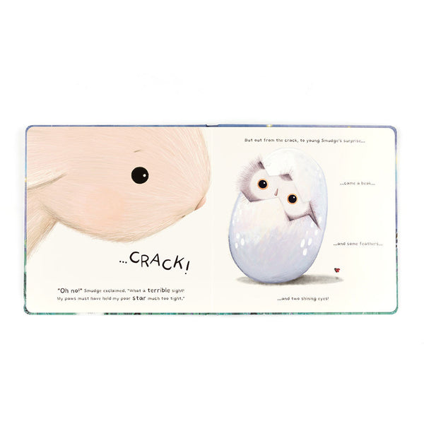 Illustration of a baby and a white creature emerging from an egg with text.
