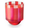 A boxed glass candle with red and pink stripes designed for holiday use.