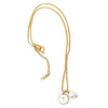 Gold necklace with a cross pendant on a white background