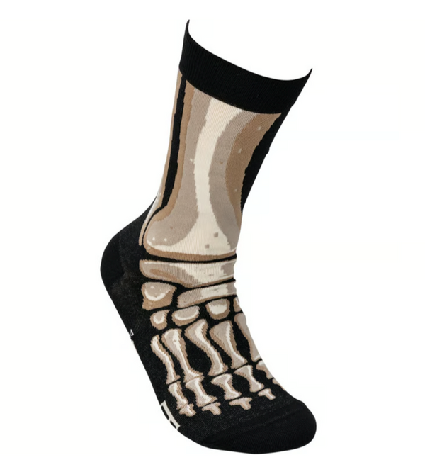 Skeletoon socks with black and white design on a white background