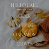 Autumn-themed text overlay with pumpkins and a knitted scarf on a blurred background.
