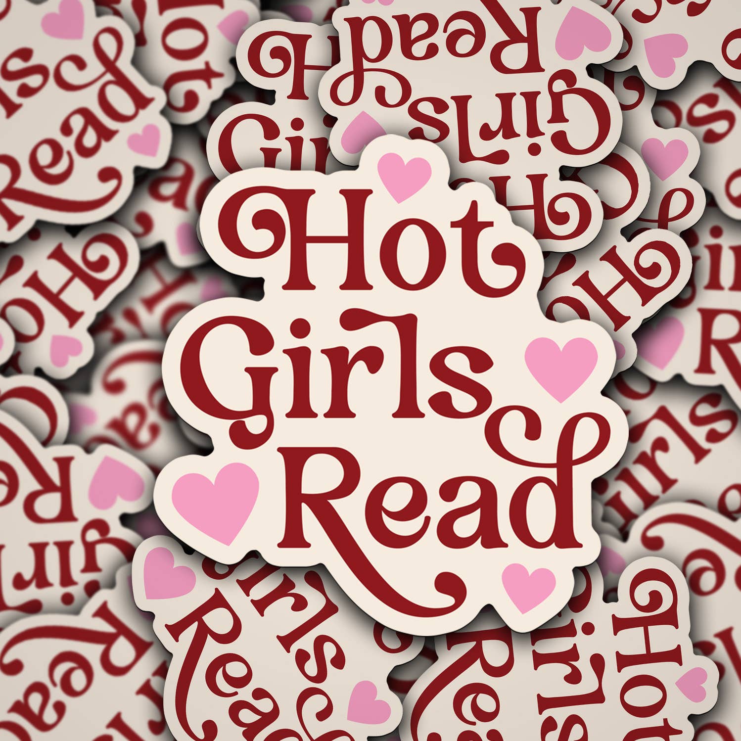 Sticker with 'Hot Girls Read' text surrounded by hearts on a patterned background