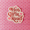 Decorative sticker with 'Hot Girls Read' text on a pink polka dot background
