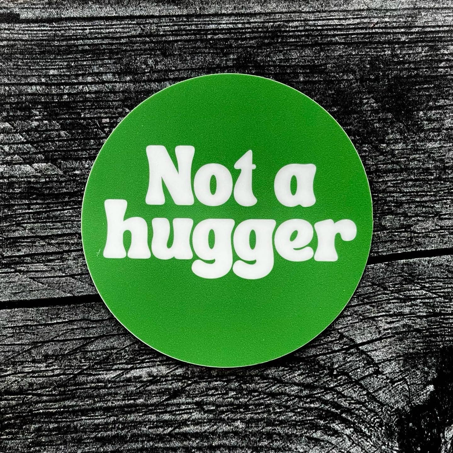 NOT A HUGGER STICKER
