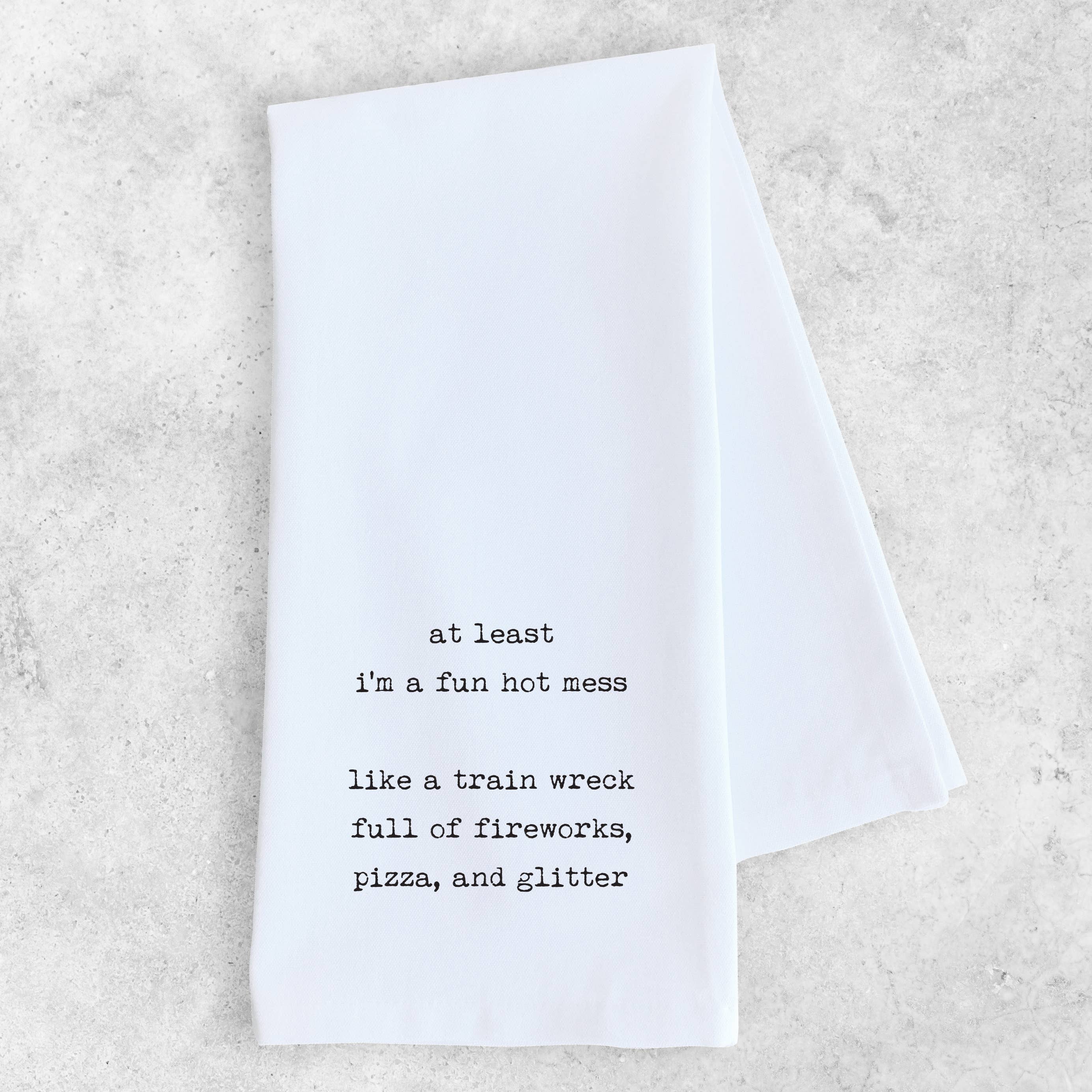 White towel with black text on a light gray background