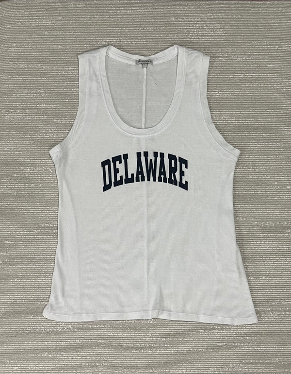 White tank top with 'DELAWARE' printed on it against a textured gray background
