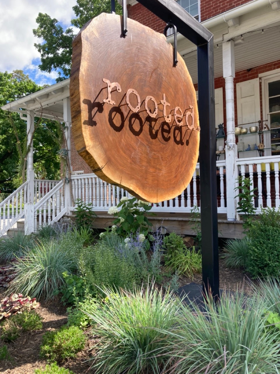 Rooted Sign Rooted.