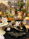CERAMIC SKELETON IN TUB SHAPED BOWL, BLACK, WHITE & ORANGE COLOR