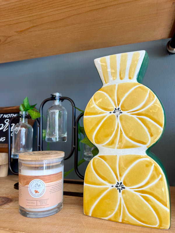 STONEWARE VASE WITH WAX RELIEF DESIGN, YELLOW