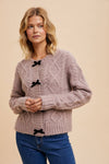 BOW ACCENT CABLE KNIT SWEATER