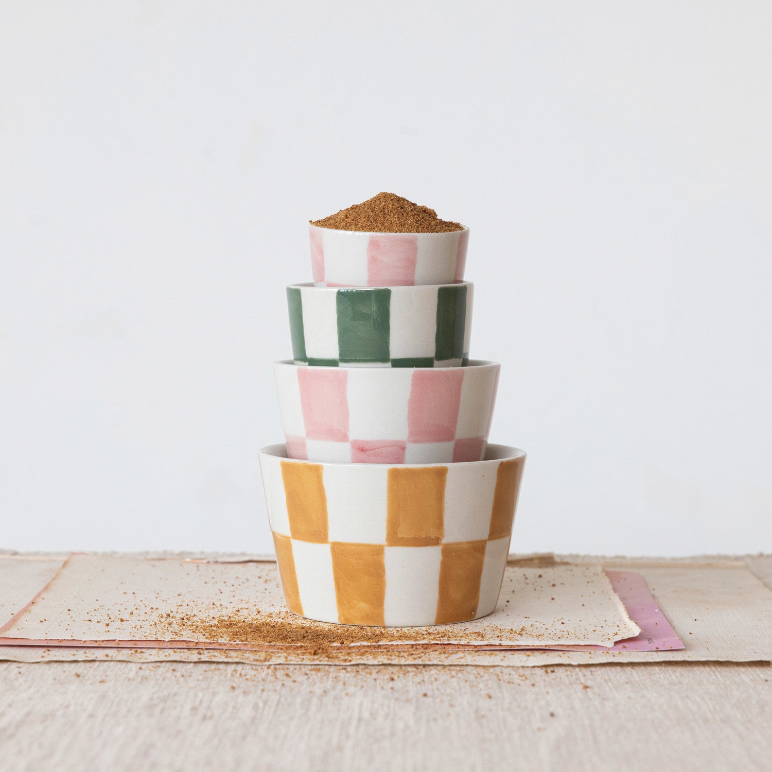 HAND-PAINTED CHECKERED STONEWARE NESTING BOWLS