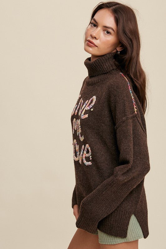 GIVE ME LOVE STITCHED MOCK NECK SWEATER