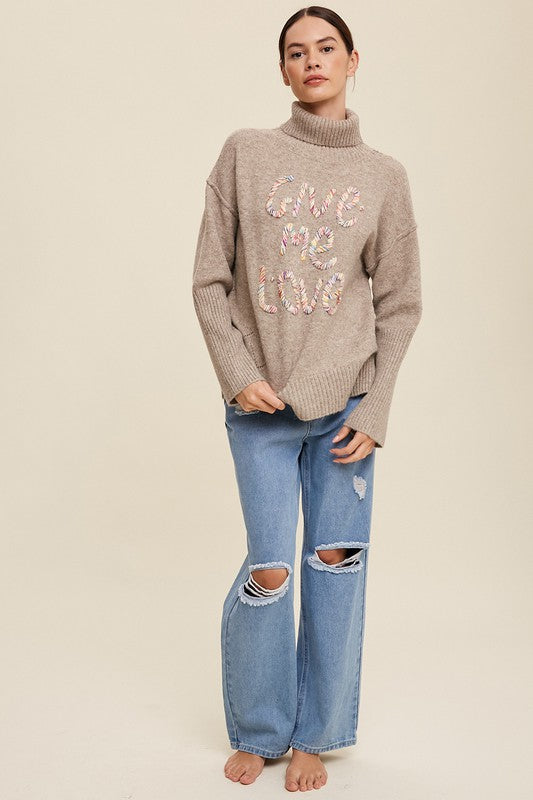 GIVE ME LOVE STITCHED MOCK NECK SWEATER