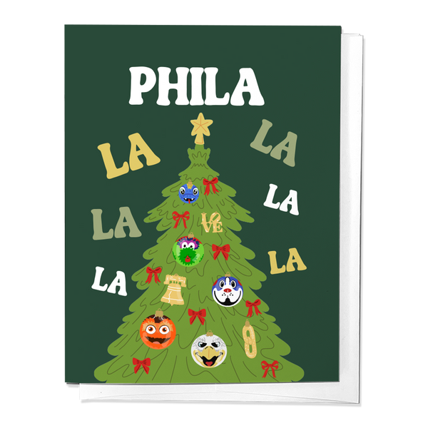 A Christmas-themed greeting card with a green background featuring a Christmas tree and various cartoon characters from Philly sports. The text 'PHILA LA LA' is prominently displayed.