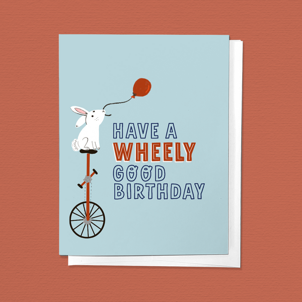 HAVE A WHEELY GOOD BIRTHDAY: RABBIT ON A UNICYCLE GREETING CARD