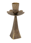 A rustic bronze metal candle holder with a textured, aged finish, featuring a tapered base and a petal-shaped cup, isolated on a white background.