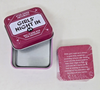 Pink tin box with 'Girls' Night In' cards on a white background