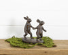 RABBITS WALKING HAND IN HAND