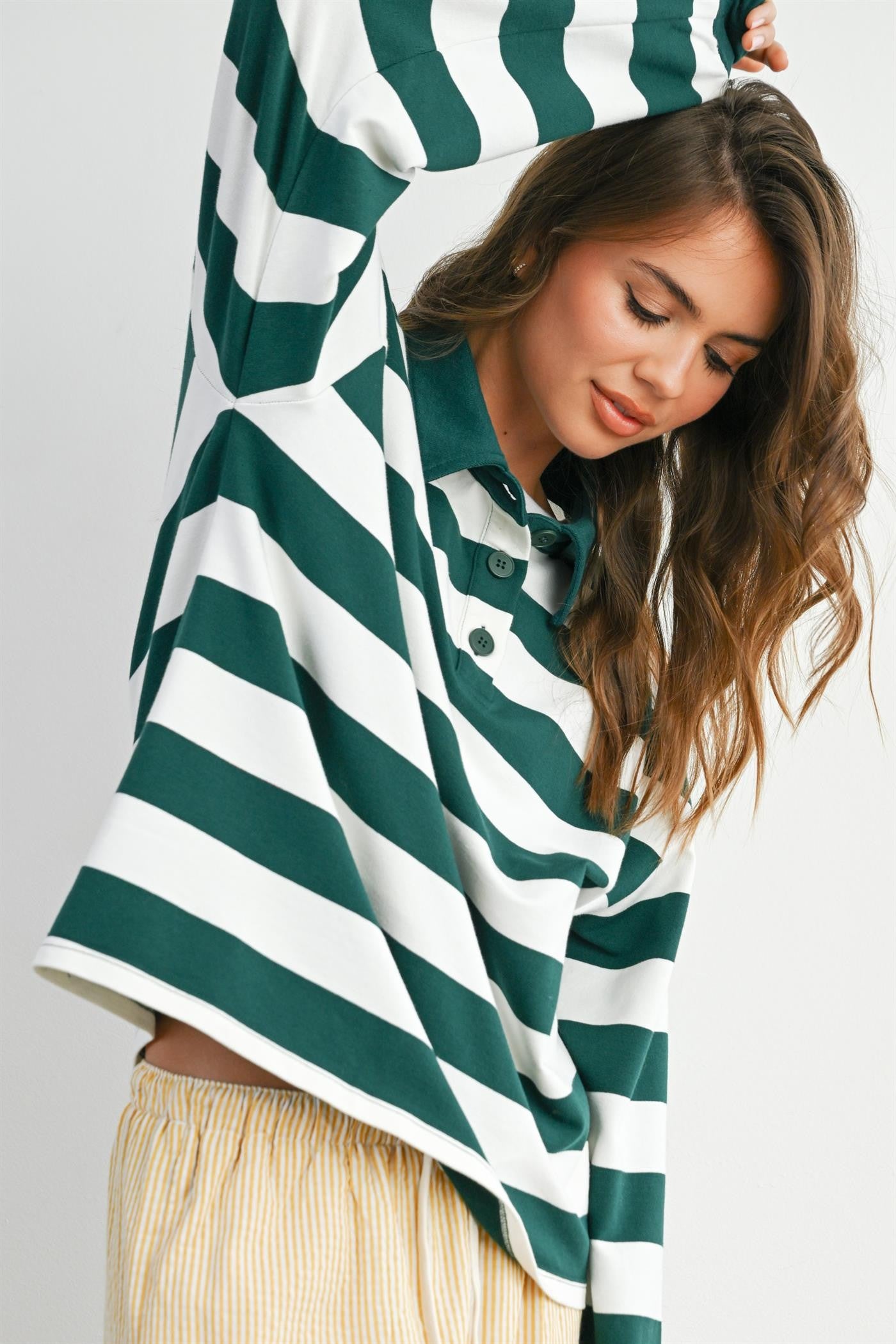 STRIPED QUARTER-BUTTONED COLLARED SWEATSHIRT