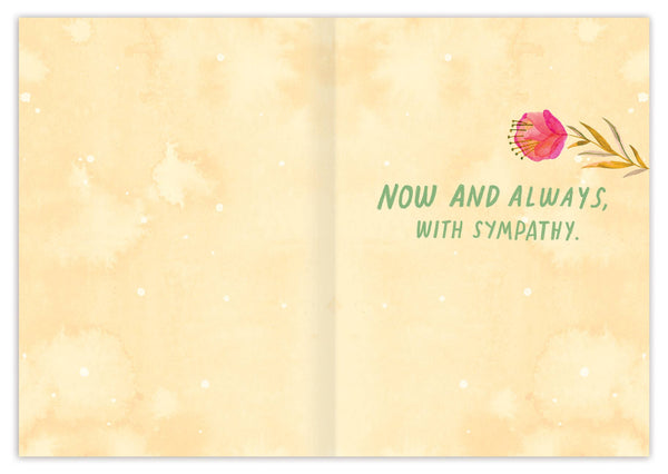 Sympathy card with floral design and text on a soft yellow background