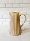40 OZ. STONEWARE RIBBED PITCHER, REACTIVE GLAZE, CREAM COLOR