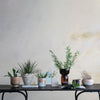 HAND-PAINTED STONEWARE PLANTER WITH FLOWERS (HOLDS 5" POT) (EACH ONE WILL VARY)