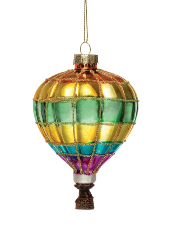 A multicolored glass hot air balloon ornament with glitter, featuring stripes of different colors.