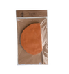 Brown leather patch in a clear plastic bag on a white background