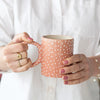 14 OZ. HAND-PAINTED STONEWARE MUG WITH RIASED DOTS