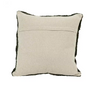 Beige pillow with black trim on a white background