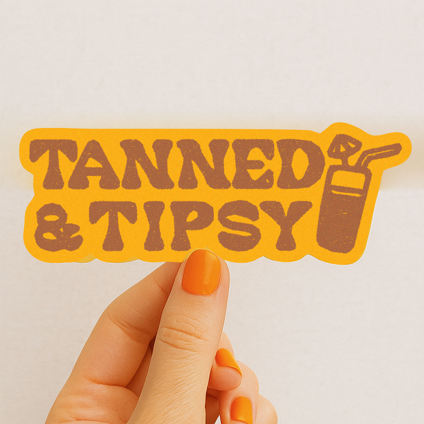 TANNED AND TIPSY STICKER