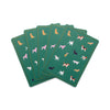 Set of playing cards with dog illustrations on a green background