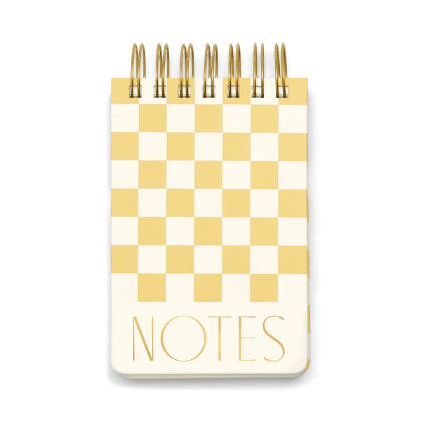 Checkered notebook with 'NOTES' text on a white background