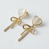 CAT'S EYE HEART BOW TASSEL EARRINGS