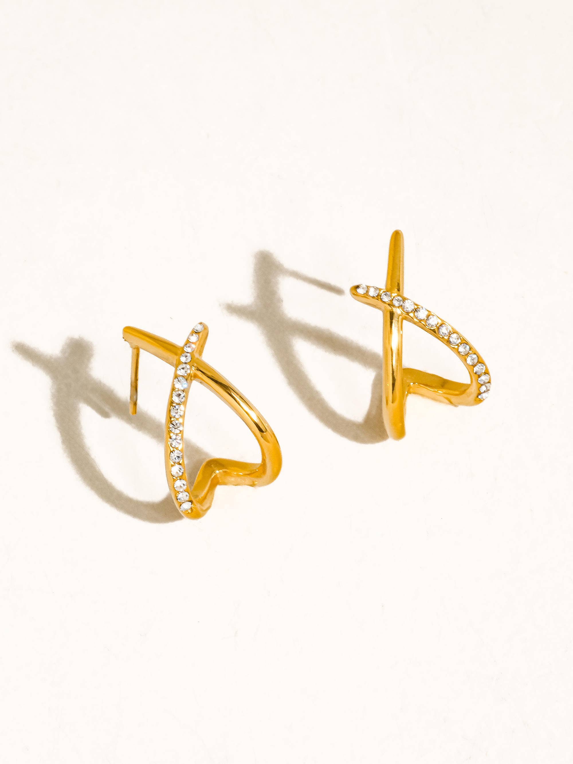 ECHO 18K GOLD NON-TARNISH CZ CROSSOVER EARRINGS