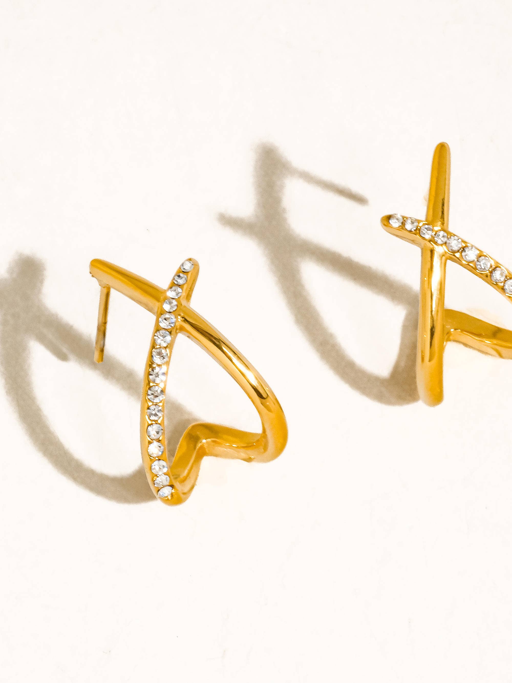 ECHO 18K GOLD NON-TARNISH CZ CROSSOVER EARRINGS