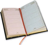 Open planner with two different pages on a white background