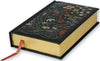 Decorative book with floral designs and a ribbon on a white background