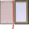Open planner showing a calendar page and notes section with decorative elements.