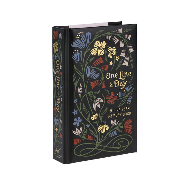 Decorative book titled 'One Line a Day' with floral designs on a white background